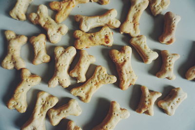 Full frame shot of dog biscuits on table