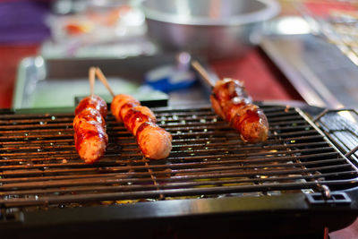 Close-up of meat on barbecue grill