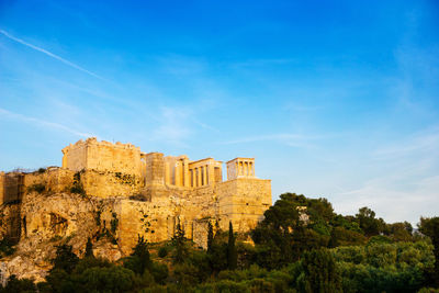 Low angle view of fort against blue sky