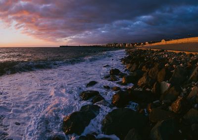 Scenic view of sea against sky during sunset