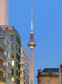 Low angle view of buildings against clear sky