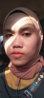 Close-up portrait of beautiful young woman