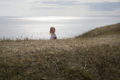 A girl by the ocean