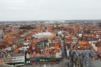 Aerial view of city against sky