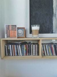 Stack of objects on shelf