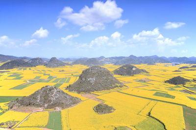 High angle view of fields against sky