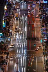 High angle view of traffic on city street at night