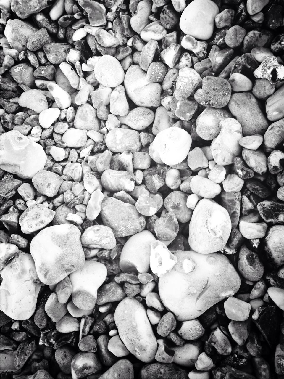 abundance, full frame, backgrounds, large group of objects, stone - object, pebble, textured, high angle view, nature, stone, rock - object, day, outdoors, no people, tranquility, stack, pattern, heap, rough, field