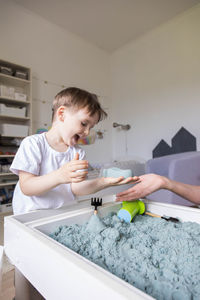 Portrait of boy painting