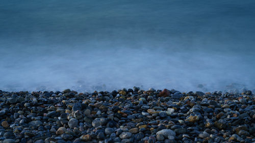 Stones on shore at beach