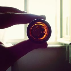 Close-up of hand holding camera