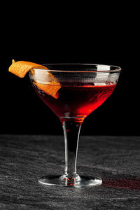 Close-up of wineglass on table