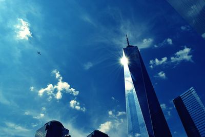 Low angle view of skyscrapers against sky