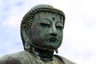 Close-up of statue against sky