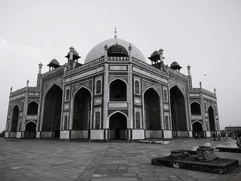 Facade of historic building against sky