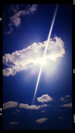 Low angle view of vapor trails in sky