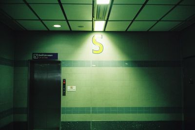 Illuminated lights on wall