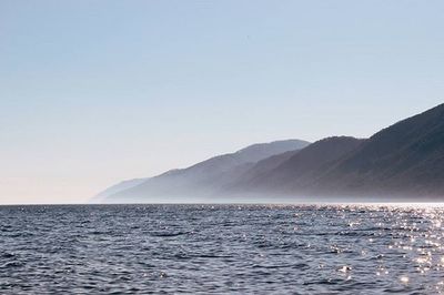 Scenic view of calm sea against clear sky