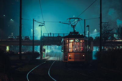 Train on railroad track at dusk