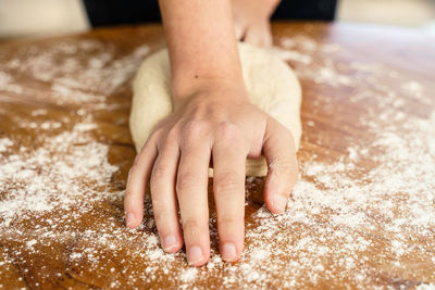 Close-up of woman preparing food