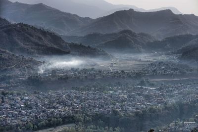 Aerial view of mountains against sky