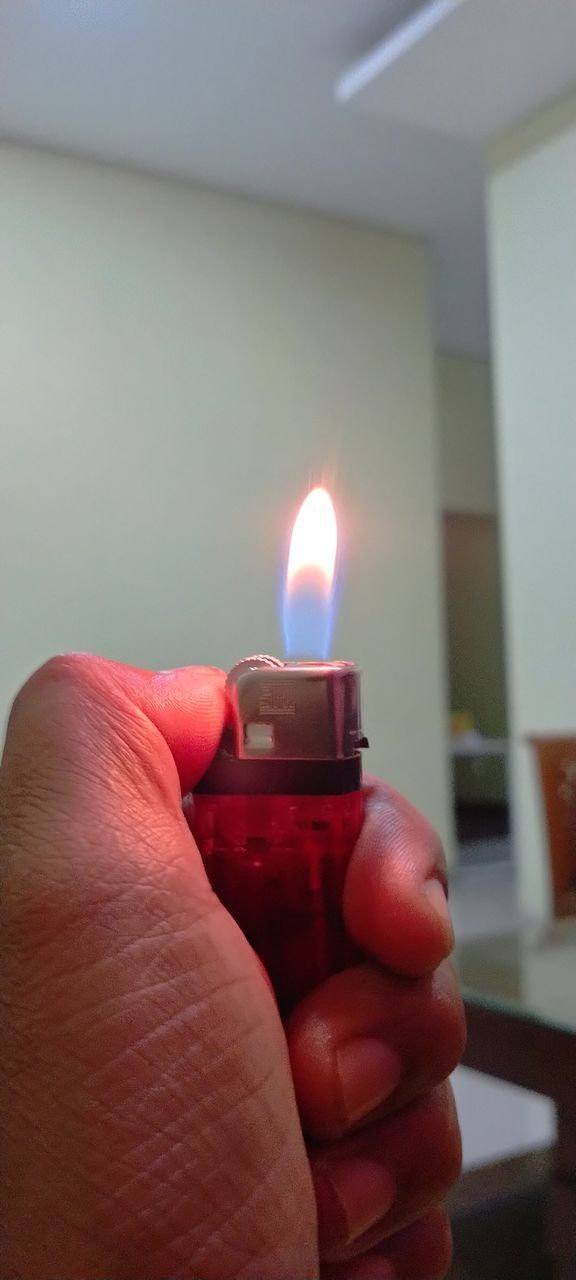 fire, hand, burning, flame, holding, red, candle, finger, indoors, one person, close-up, heat, focus on foreground, interior design, illuminated, lighting, adult, lifestyles, nature, personal perspective