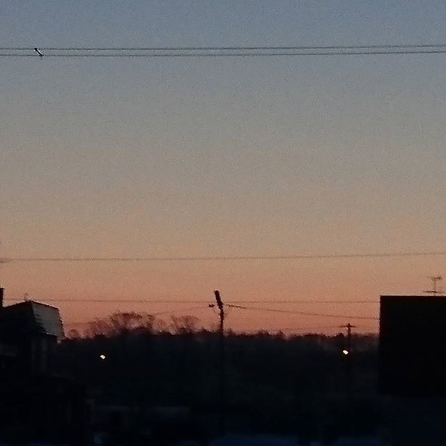 silhouette, sunset, power line, electricity pylon, orange color, electricity, cable, clear sky, sky, low angle view, copy space, power supply, building exterior, connection, built structure, dusk, nature, architecture, power cable, dark