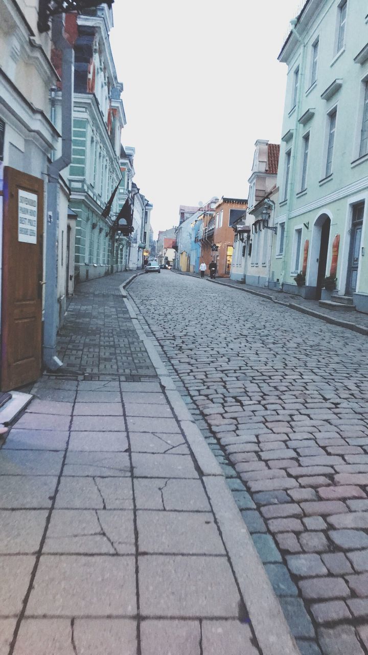 building exterior, architecture, built structure, cobblestone, city, street, outdoors, the way forward, no people, day, sky