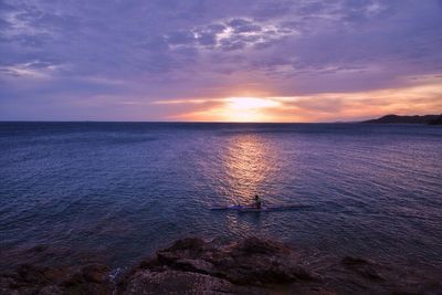 Scenic view of sea at sunset