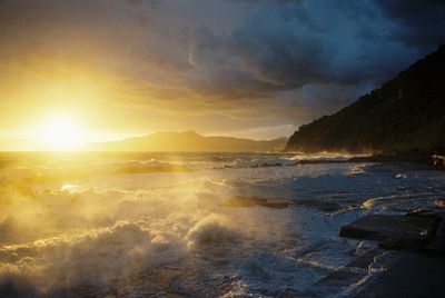 Scenic view of sea against sky during sunset