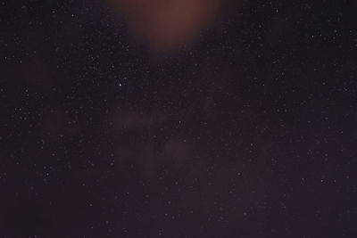 Low angle view of stars in sky at night