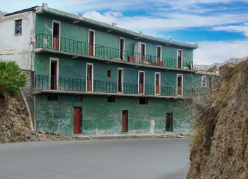 Exterior of old building in city against sky