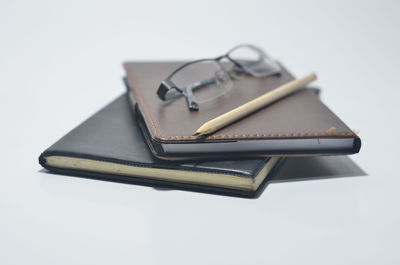High angle view of pen on table against white background