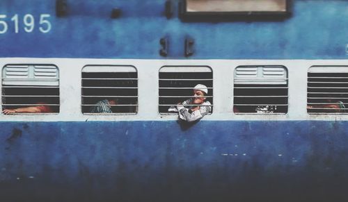 Portrait of man sitting in bus