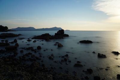 Scenic view of sea against sky during sunset