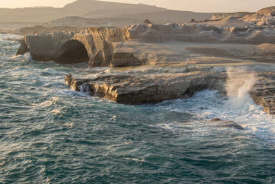 Scenic view of rocks in sea