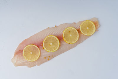 High angle view of lemon slice on table
