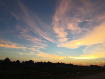 Scenic view of silhouette landscape against sky during sunset