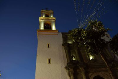 Low angle view of lit up at night