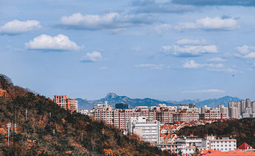 High angle shot of townscape against sky