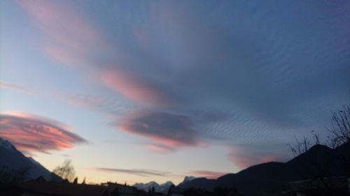 Low angle view of silhouette mountain against sky