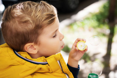 Close-up of boy holding ice cream