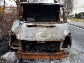 Close-up of abandoned car