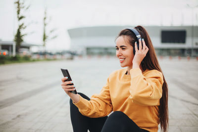 Young woman using mobile phone