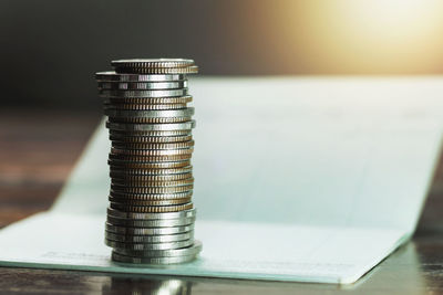 Close-up of coins on table