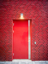 Closed door of red building