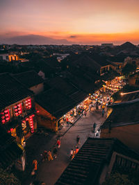 High angle view of cityscape against sky during sunset