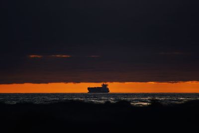 Scenic view of sea at sunset