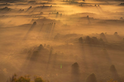 High angle view of landscape against sky during sunrise