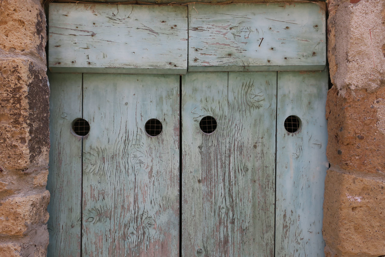 CLOSE-UP OF OLD DOOR